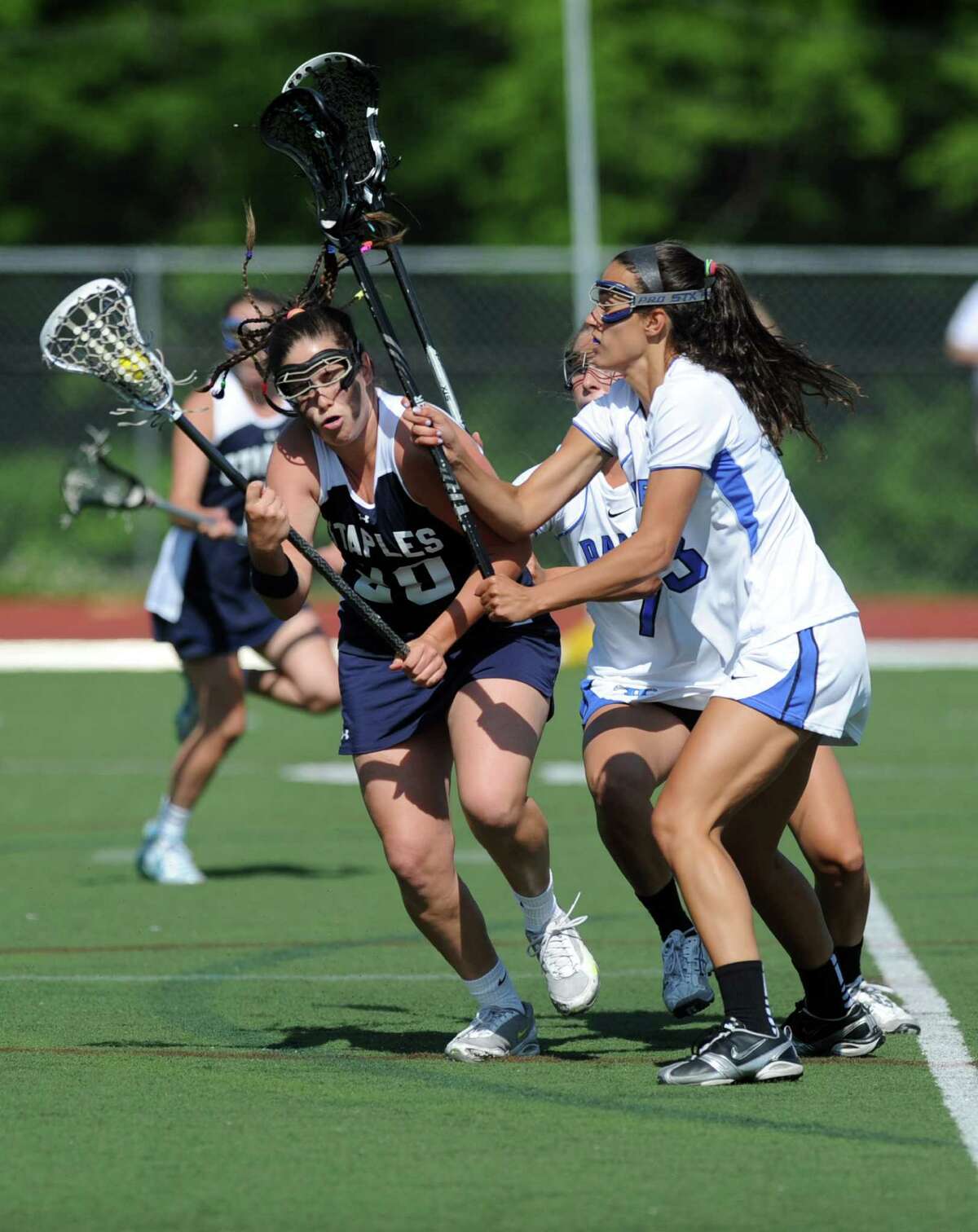 Staples' Remy Nolan controls the ball during Friday's FCIAC quarterfinal game at Darien High School on May 18, 2012.