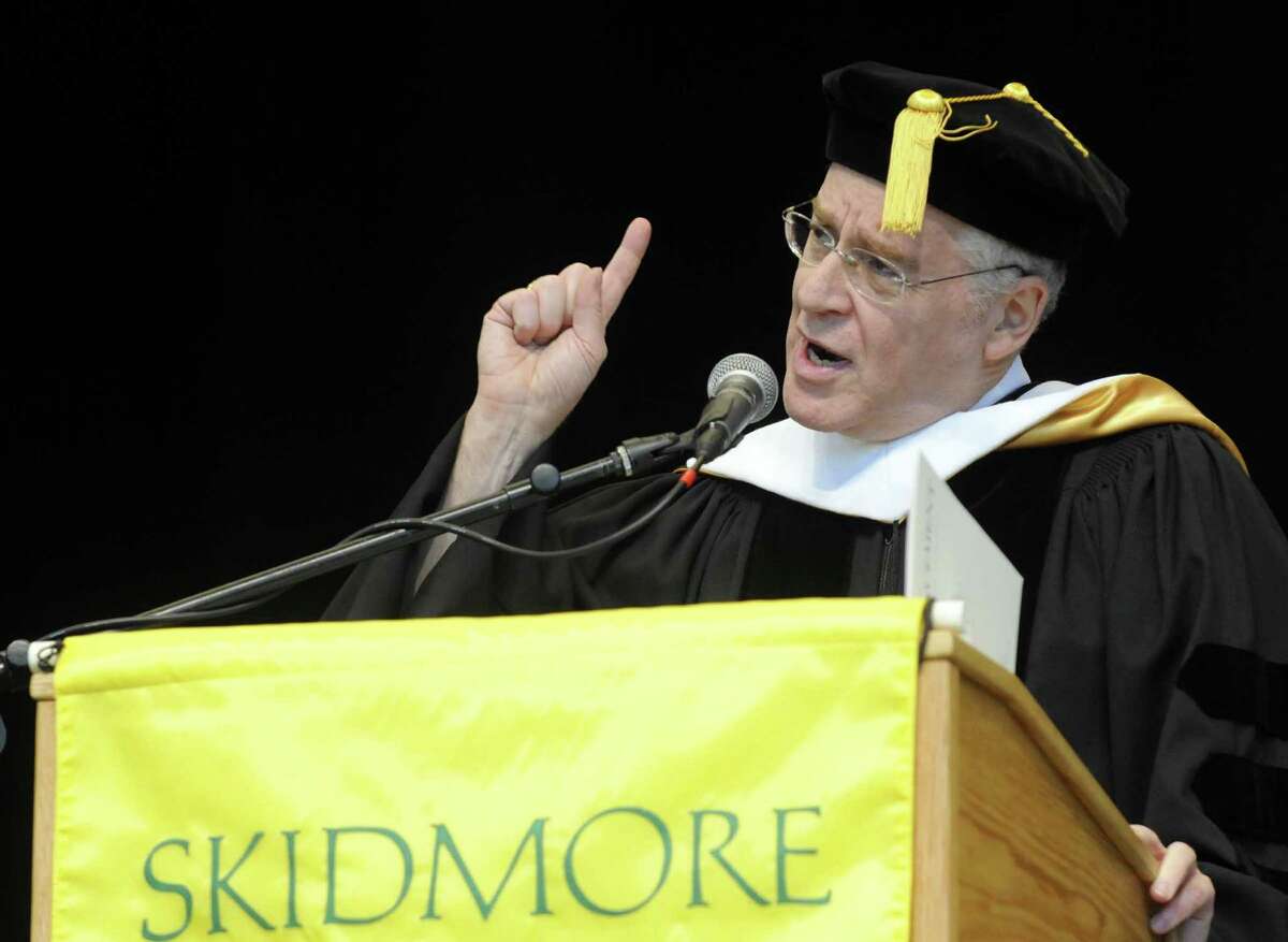 Pulitzer Prize-winning author Ron Chernow speaks after receiving an honorary Doctor of Letters from Skidmore College president Philip A. Glotzbach during the college's 101st commencement at SPAC in Saratoga Springs on May 19, 2012.
