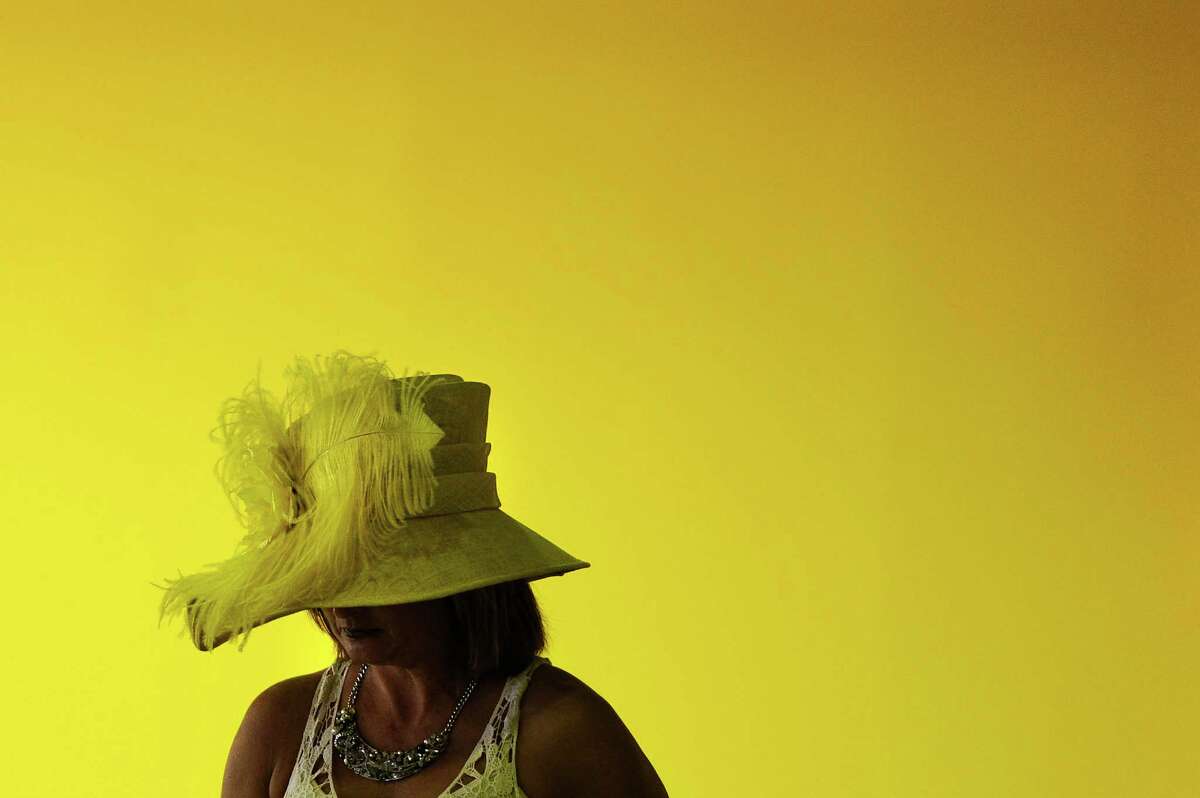 A race fan walks through the grandstand prior to the 137th running of the Preakness Stakes at Pimlico Race Course on May 19, 2012 in Baltimore, Maryland.
