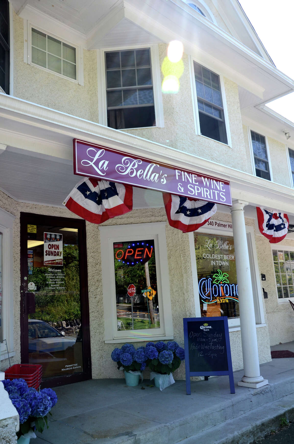 Liquor store customers toast Sunday sales