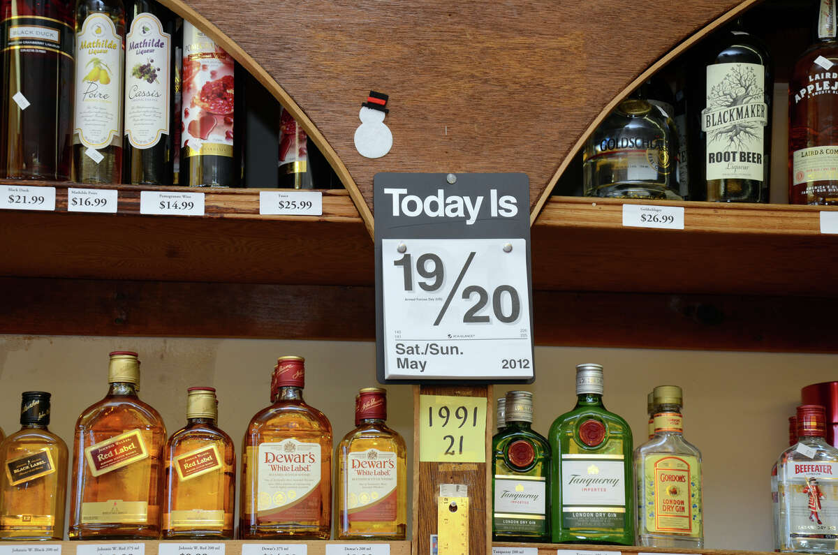 Liquor store customers toast Sunday sales