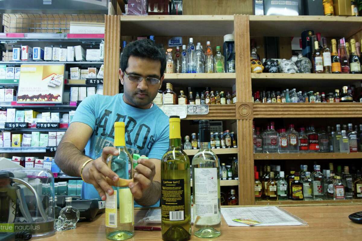 Liquor Store Customers Toast Sunday Sales