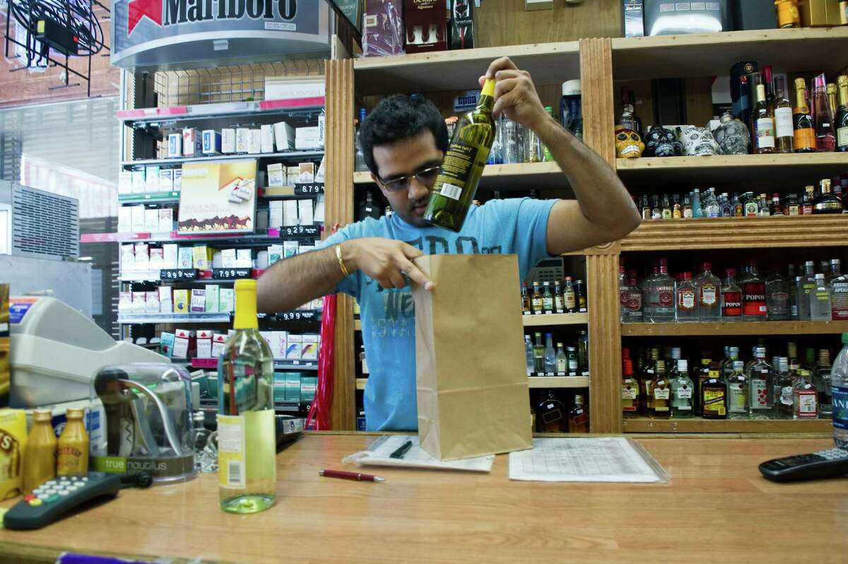 Liquor Store Customers Toast Sunday Sales