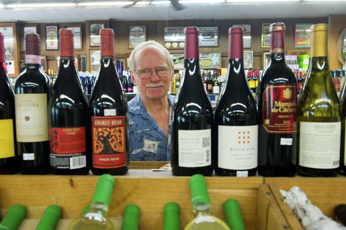 Liquor store customers toast Sunday sales