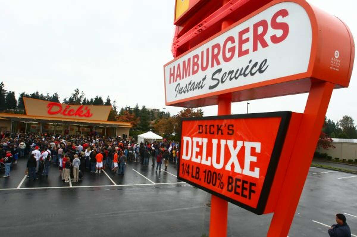Dick's burgers : Not the juiciest patty ever, but a burger, shake and limp, salty fries at this orange drive-in is a quintessential Seattle experience. Or Edmonds, pictured, site of the newest Dick's. (JOSHUA TRUJILLO / SEATTLEPI.COM)