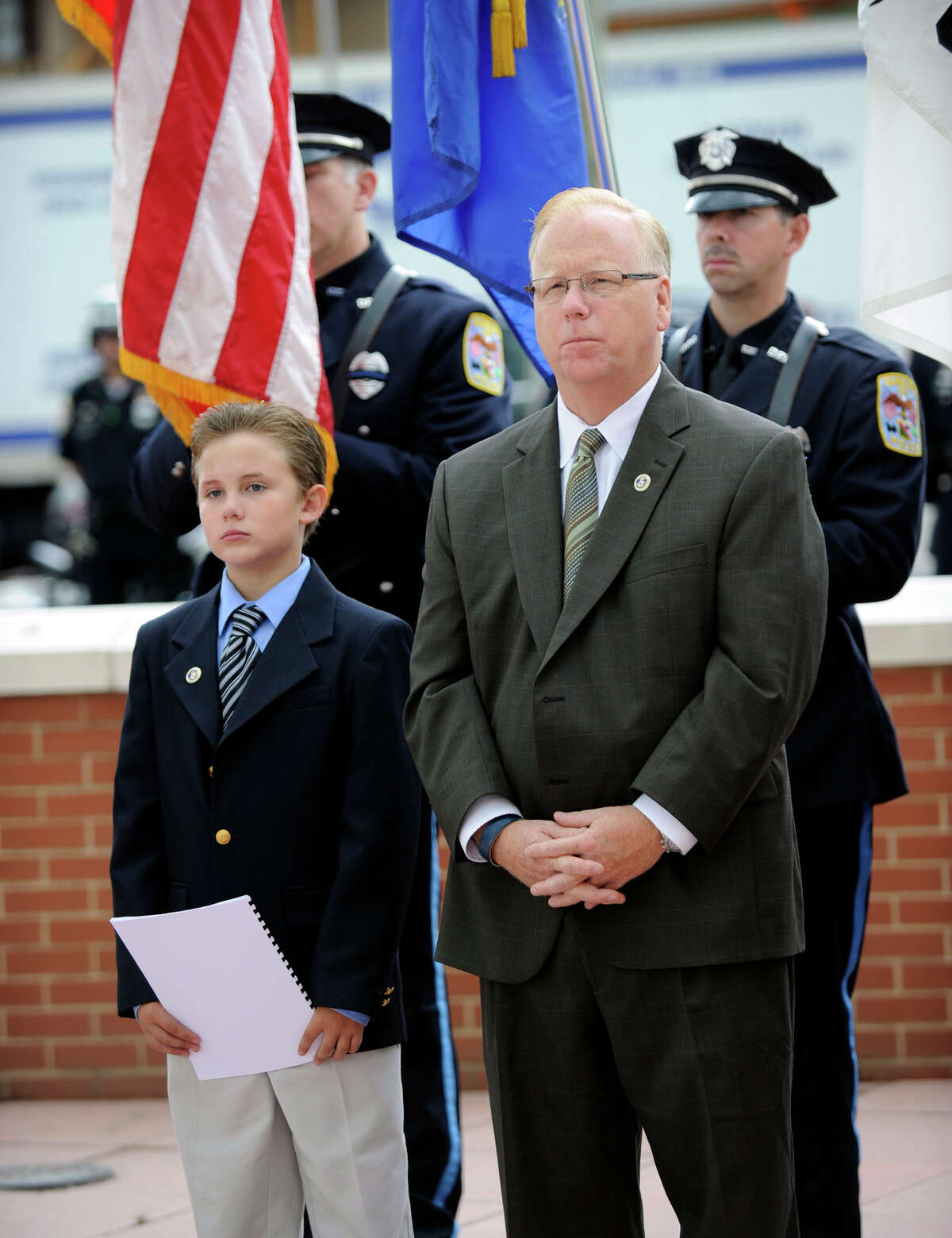 Mayor-for-the Day, Connor Hefferon, 11, a fifth-grader at Great Plain Elementary School, accompanies Danbury Mayor Mark Boughton to the Danbury Police Department's Memorial Service and 28th Annual Awards Ceremony, Wednesday mornning, May 23, 2012.