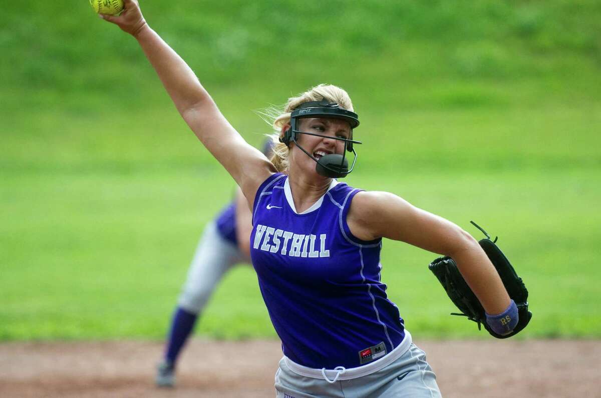 Westhill's Allison Macari throws as Westhill High School hosts New Canaan in the FCIAC softball quarterfinals in Stamford, Conn., May 23, 2012.
