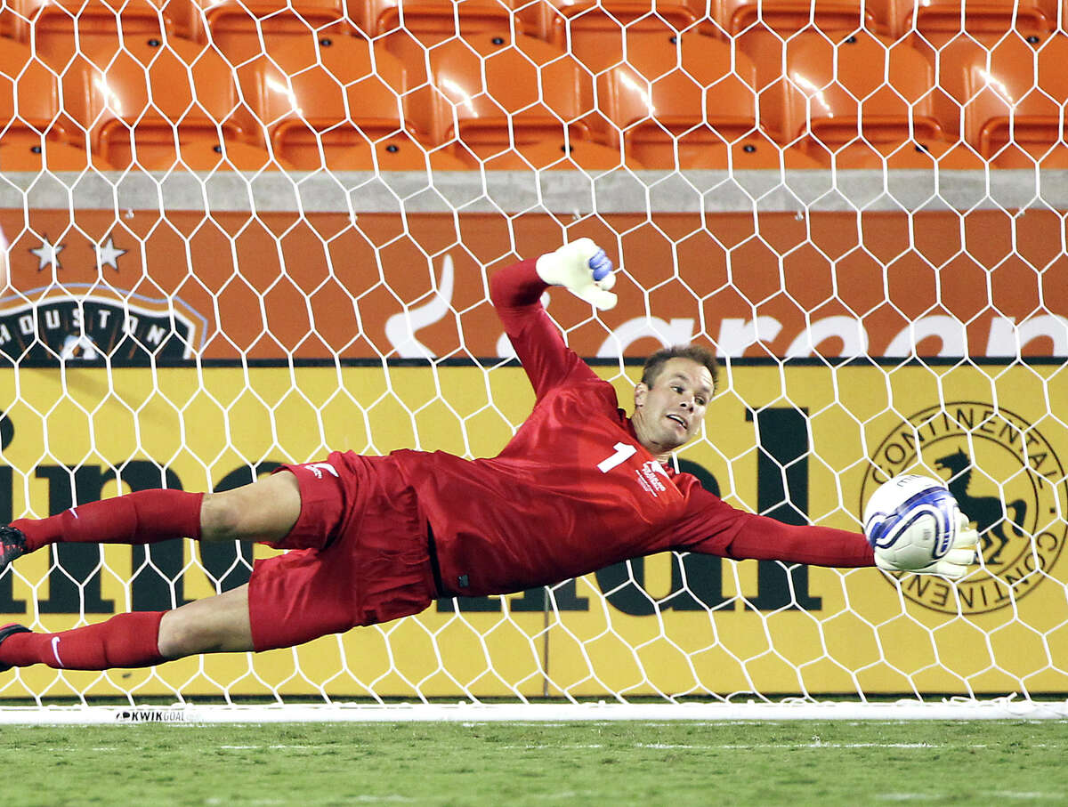 New Zealand goal keeper Mark Paston keeps a ball from going into the goal during the second half of an international friendly game against El Salvador, Wednesday, May 23, 2012, in BBVA Compass Stadium in Houston.