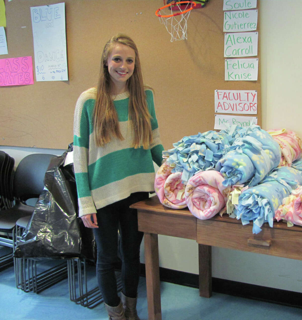 Darien High School senior and Community Council leader McKinley Stauffer arranged the Blankets for Preemies day at DHS on March 16, 2012, where students completed more than 60 blankets throughout the day. Darien, Conn.
