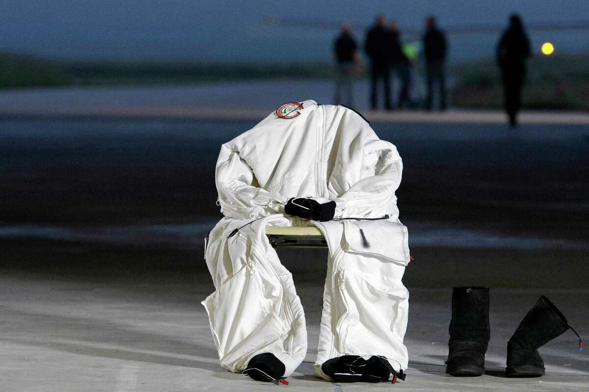 The suit for Solar Impulse's Chief Executive Officer and pilot Andre Borschberg is set out for him before the experimental aircraft "Solar Impulse," HB-SIA, takes off for its first intercontinental flight to Morocco.