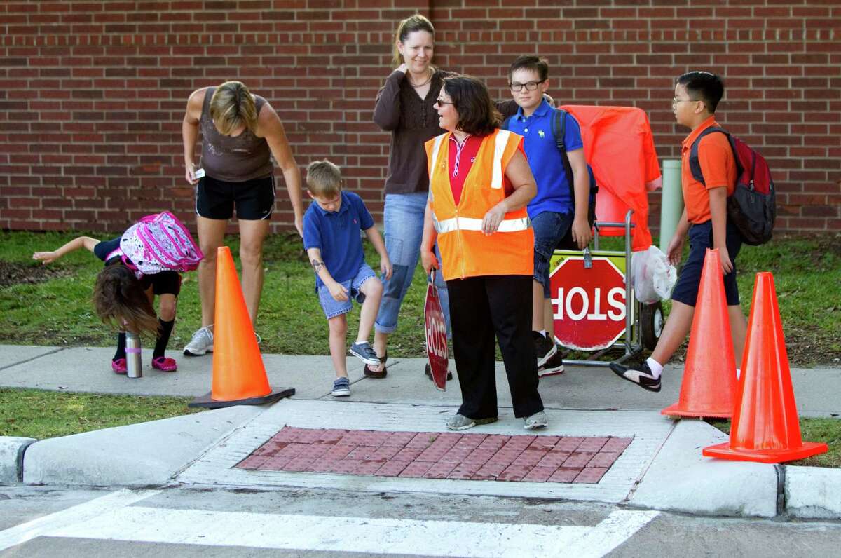 Despite what experts say, school crossing guard Angie Foret says students and parents are slapping and scratching.