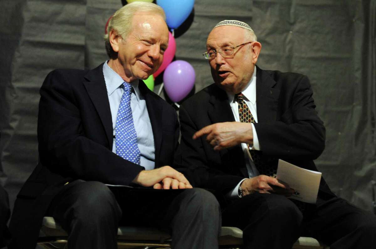 Lieberman helps finish Stamford school's Torah