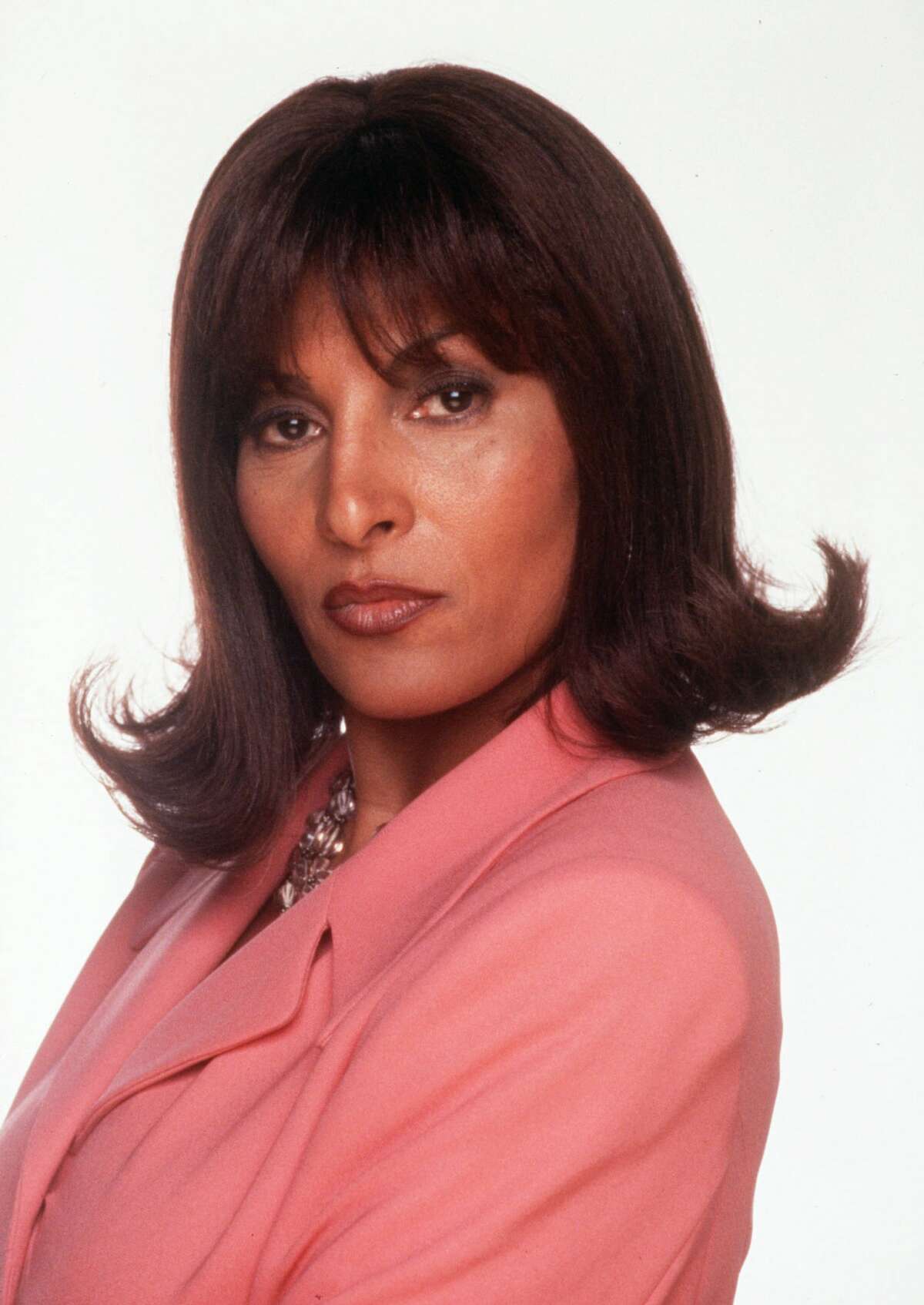 FILE--Actress Pam Grier is shown in this 1998 handout photo. Grier has canceled a weekend trip to an inaugural festival celebrating the accomplishments of women in film in Rochester, N.Y. Grier said she was ill and unable to travel from California to the High Falls Film Festival to accept a career achievement award on Saturday, Oct. 20, 2001. (AP Photo/Jim Bridges, HO)