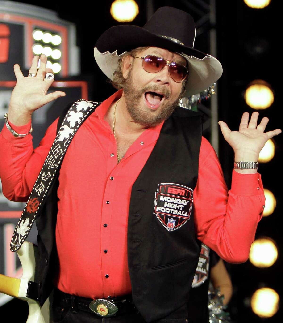 FILE - In this July 14, 2011, file photo, Hank Williams Jr. performs during the recording of a promo for ESPN's broadcasts of "Monday Night Football," in Winter Park, Fla. Are you ready for some football? Hank Williams Jr. isn't anymore. The country singer and ESPN each took credit for the decision Thursday morning, Oct. 6, 2011, to no longer use his classic intro to "Monday Night Football." The network had pulled the song from the game earlier this week after Williams made an analogy to Adolf Hitler in discussing President Barack Obama on Fox News on Monday morning. (AP Photo/John Raoux, File)