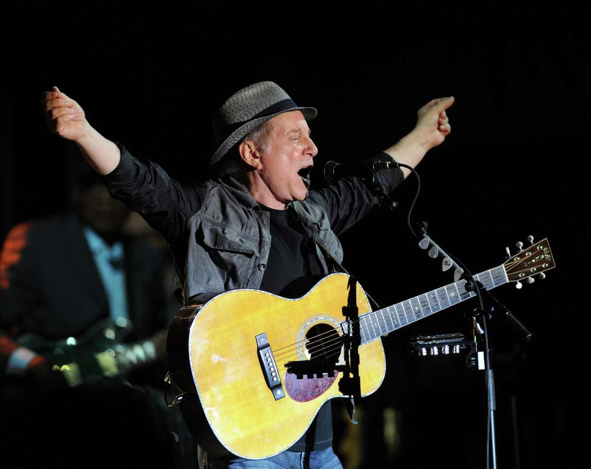 Paul Simon performs during the Greenwich Town Party at Roger Sherman Baldwin Park, Saturday, May 26, 2012.
