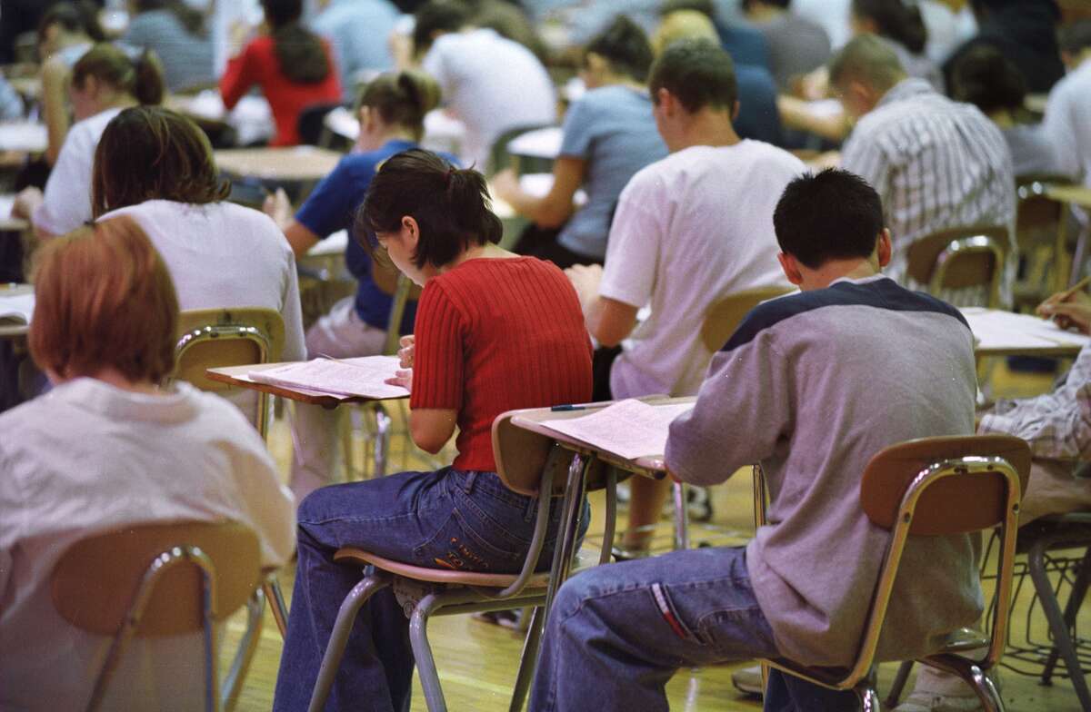 The state Education Department canceled the Regents exam in U.S. History nine days before it was to be held in June 2022 because of concerns that a question on it might cause trauma for New York's high school students after the mass shooting in Buffalo. Now the Education Department says it won't reveal the question because it may be used on a future test. Pictured are Albany High School students taking Regents exams in the school gym during a previous school year.