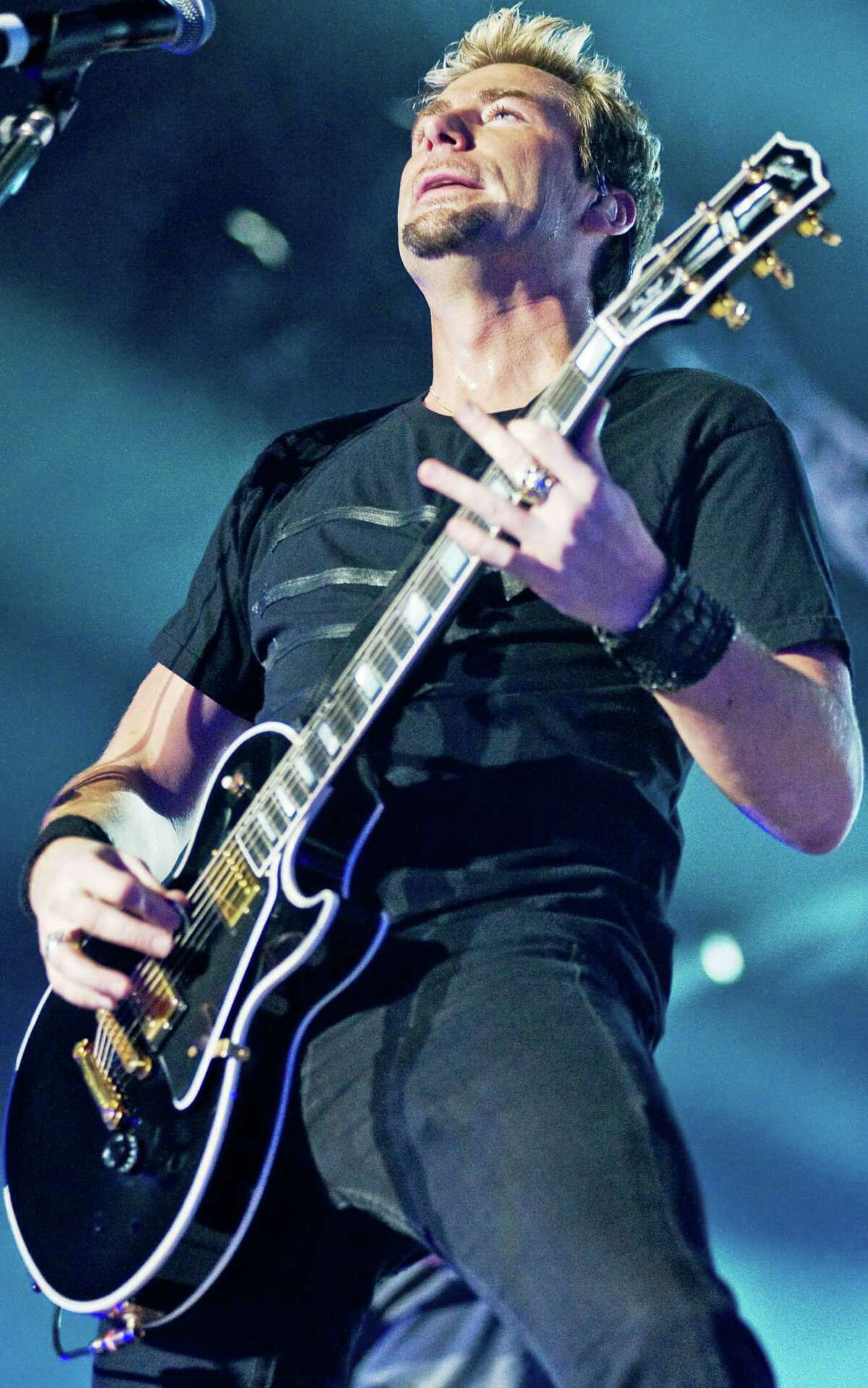 Chad Kroeger of Nickelback performs at the I Wireless Center on April 10, 2012 in Moline, Illinois.
