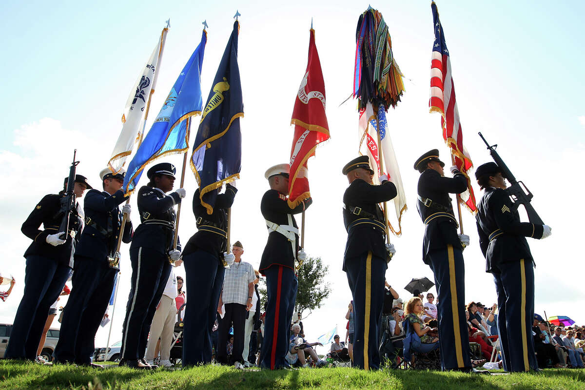 The Joint Services Color Guard presents the Colors during public the Fort Sam Houston National Cemetery Memorial Day ceremony, Monday, May 28, 2012. The ceremony was held at the assembly area at the cemetery.