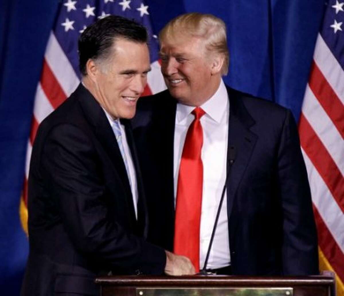 2012: Mitt Romney accepts the endorsement of Donald Trump. (Associated Press) 