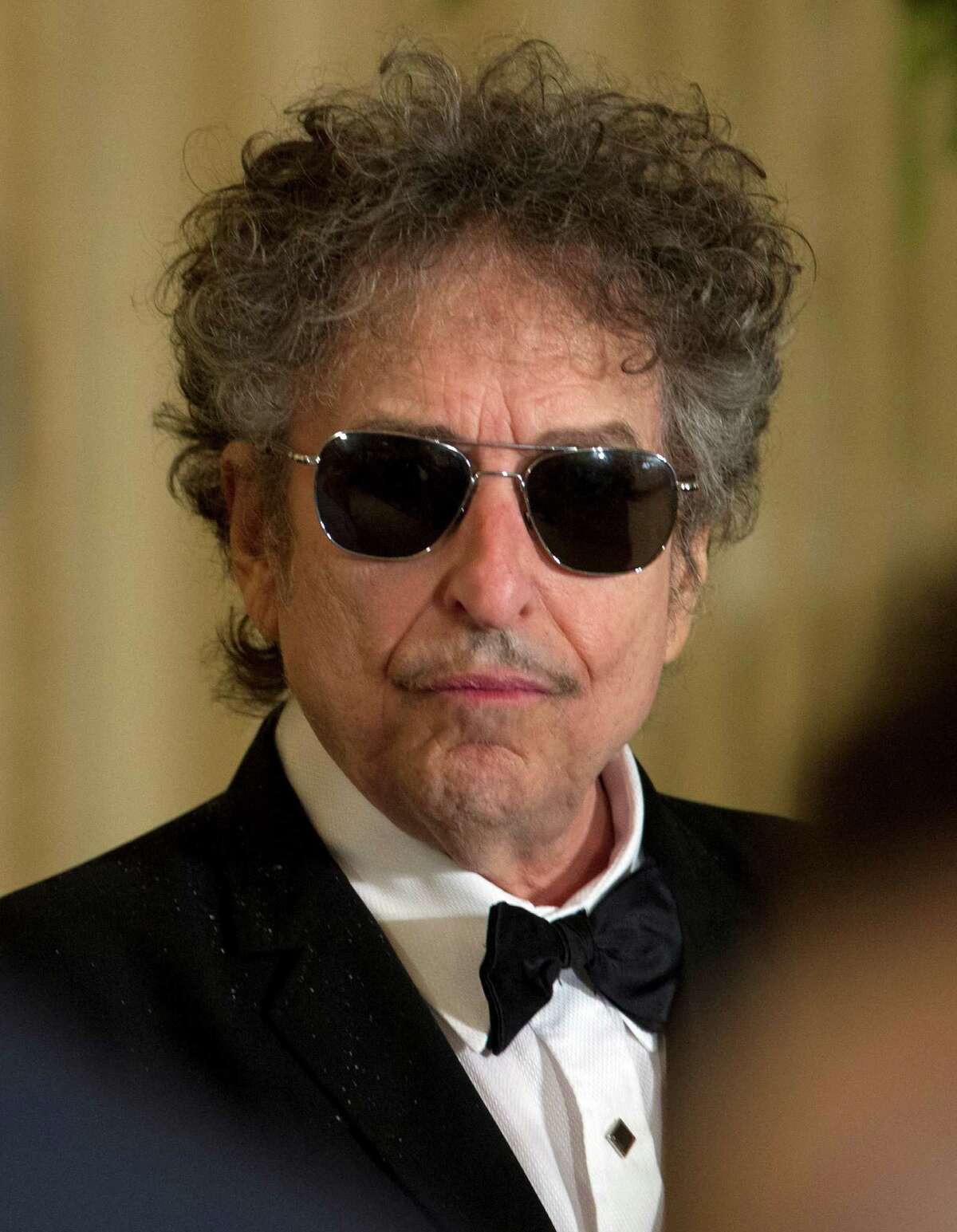 Bob Dylan arrives for a ceremony to receive the Presidential Medal of Freedom in the East Room of the White House, Tuesday, May 29, 2012, in Washington. (AP Photo/Carolyn Kaster)