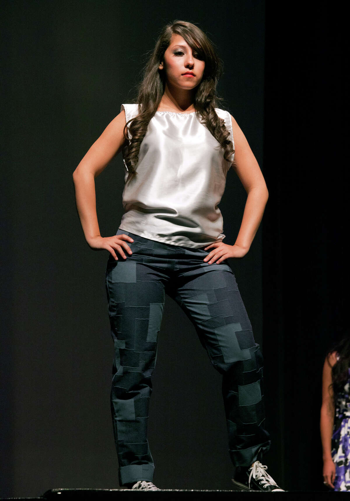 SA Life/HEIDBRINK A model wears a patched pants set by Maribel Esquivel, from the Senior Collections, at the Thomas Jefferson High School 11th Annual "All That Style" 2012 Fashion Show. Photo by Jamie Karutz.