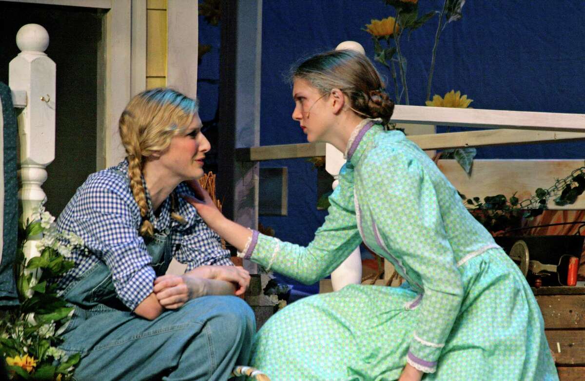 Laurey (Ali Rusch), left, gets a piece of advice from Aunt Eller (Katayoun Amir-Aslani) in the New Canaan High School production of "Oklahoma!" which will take place June 1 and June 2 in New Canaan, Conn.