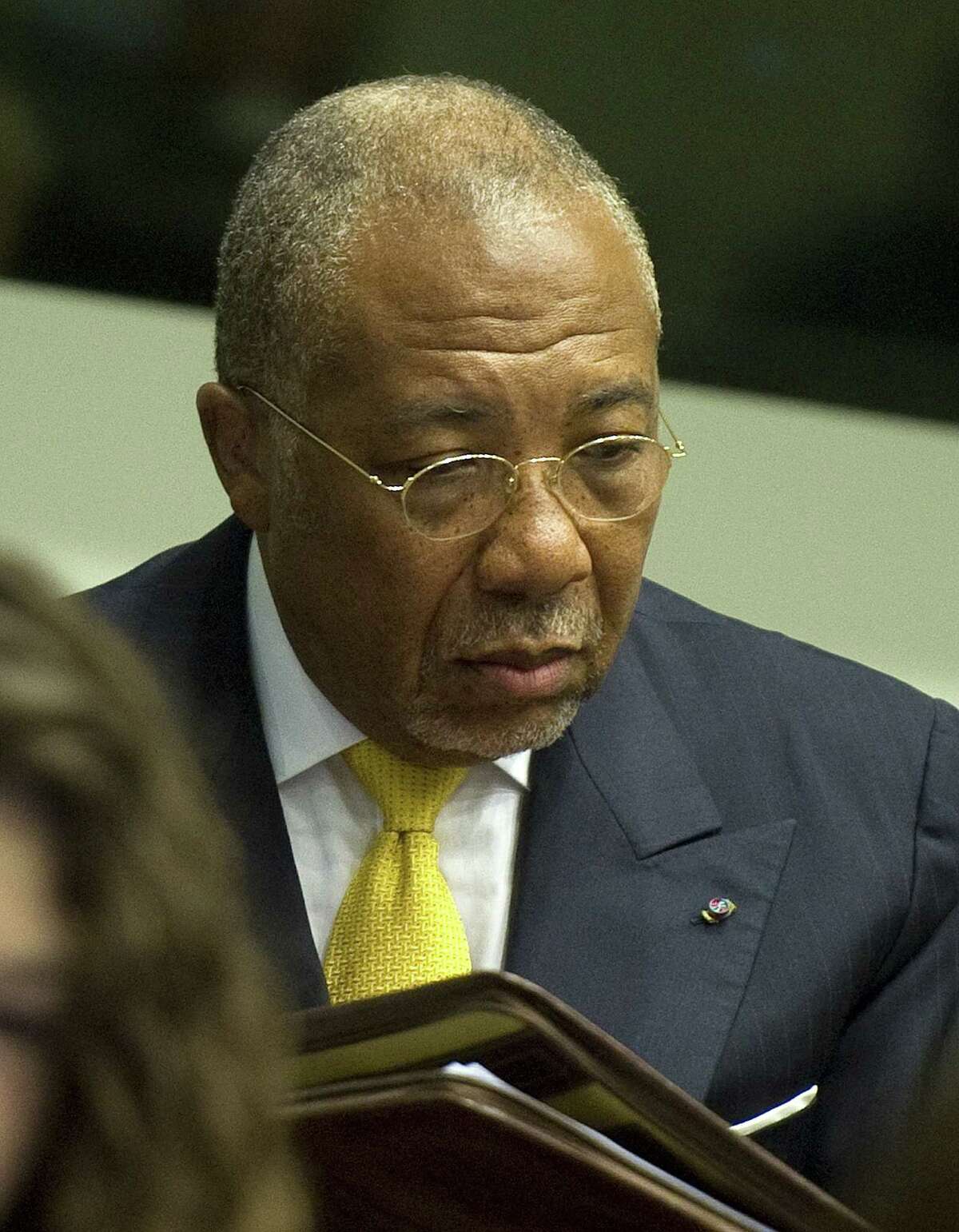 Liberian ex-president Charles Taylor, accused of arming Sierra Leone's rebels who paid him in "blood diamonds", listens to the judge at the opening of the sentencing judgement hearing at the court in Leidschendam, near The Hague, on 30 May 2012. Former Liberian president Charles Taylor will be sentenced for war crimes by a UN court on May 30, 2012 after being convicted for arming Sierra Leone rebels in return for "blood diamonds". Special Court for Sierra Leone judge Richard Lussick will deliver the ruling at a hearing due to start at 0900 GMT, the first sentence against a former head of state at an international court since the Nazi trials at Nuremberg in 1946. AFP PHOTO ANP / POOL/ TOUSSAINT KLUITERSTOUSSAINT KLUITERS/AFP/GettyImages