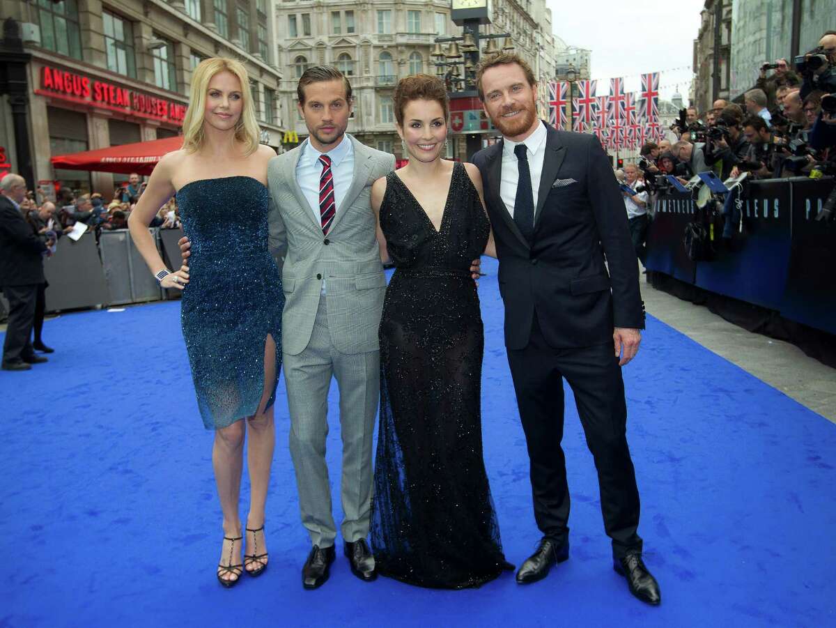 From left, actors Charlize Theron, Logan Marshall-Green, Noomi Rapace and Michael Fassbender arrive at a central London cinema for the World Premiere of Prometheus, Thursday, May 31, 2012. (AP Photo/Joel Ryan)