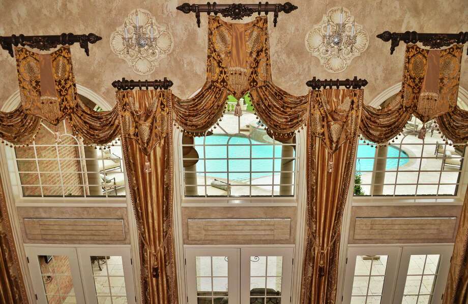 Gl Frame Times Union Two Story Window Treatments By Designer Paula Mccormick In The Family Room At A Home