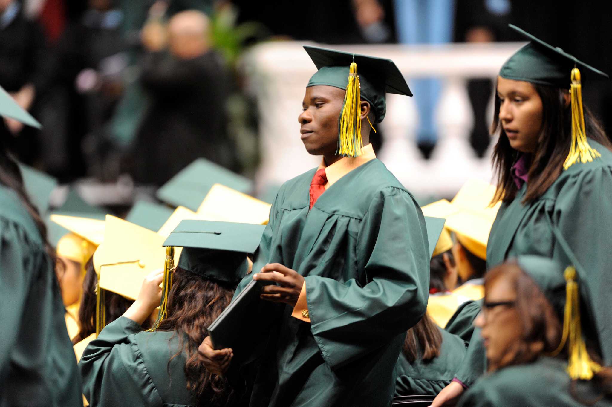 Refugee gets high school diploma in two years