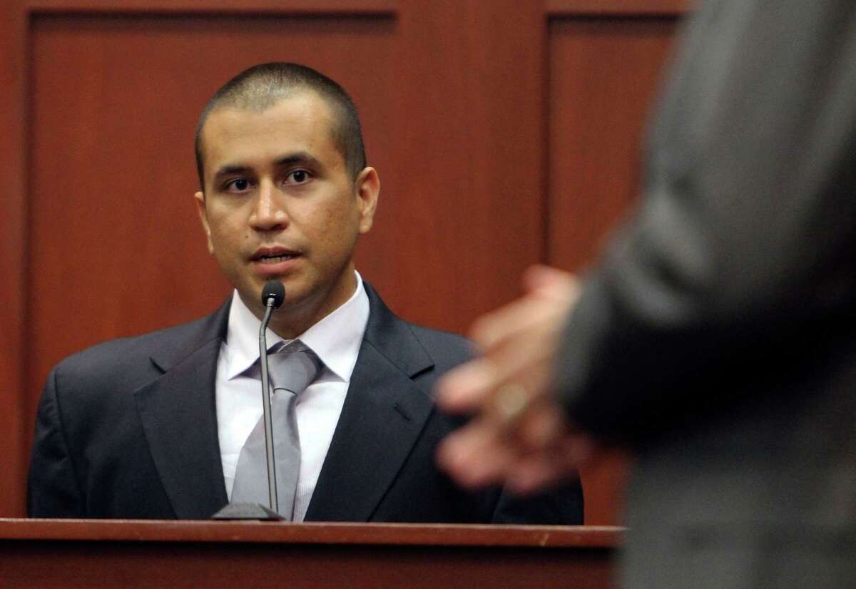 FILE - In this April 20, 2012 file photo, George Zimmerman, left, answers a question from attorney Mark O'Mara during a bond hearing in Sanford, Fla. A judge on Friday, June 1, 2012 revoked Zimmerman's bond and ordered him returned to jail within 48 hours. Circuit Judge Kenneth Lester said Zimmerman misled the court about how much money he had available when his bond was set for $150,000 in April. Prosecutors claim Zimmerman had $135,000 available that had been raised by a website he set up. (AP Photo/Orlando Sentinel, Gary W. Green, Pool, File)