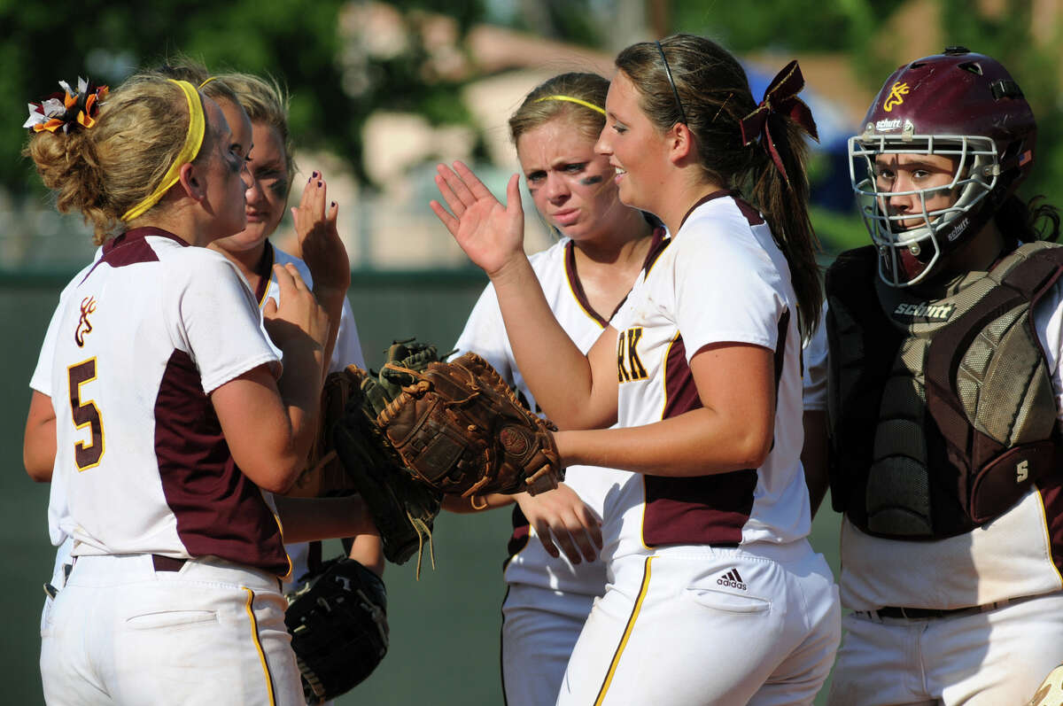 Deer Park senior pitcher Kristen Davenport, center, celebrates a strikeout against Klein Collins with teammates Rhonda Jarvis, from left, Alexis Garcia, Lexi Fryar, Caitlin Plocheck, and Jo Rivera in the top of the 6th inning during their Class 5A state softball final at Red & Charline McCombs Field in Austin on Saturday.