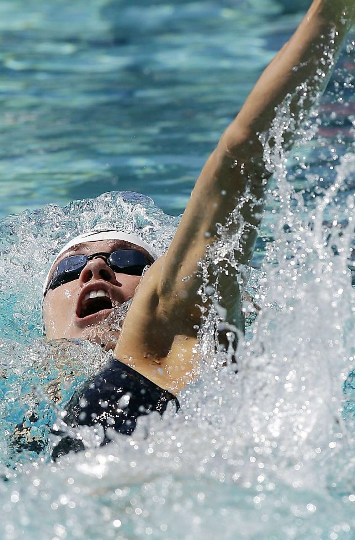 Natalie Coughlin competes in the 100-meter backstroke during the Santa Clara International Grand Prix swimming competition, Sunday, June 3, 2012, in Santa Clara, Calif. (AP Photo/Marcio Jose Sanchez)