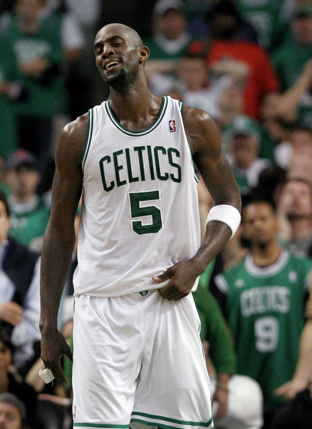 Boston Celtics forward Kevin Garnett reacts during the fourth quarter of Game 4 against the Miami Heat in their NBA basketball Eastern Conference finals playoff series in Boston Sunday, June 3, 2012. Boston won 93-91 in overtime. (AP Photo/Elise Amendola)