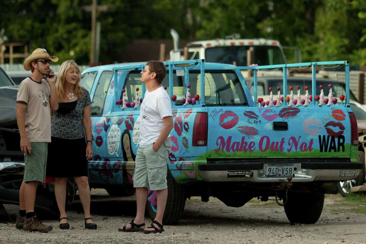 Shelley Buschur recovers her stolen art car Monday evening June 4, 2012 from an impound lot on Navigation Blvd. in the East End. "I looked at the driveway and it seemed incredibly empty," Buschur said about coming home the evening before from a concert to find that her car had been stolen. The Houston Police Department found the redecorated Chevy Silverado the next day and had Buschur pick it up at an impound lot where she had to pay to reclaim the vehicle.