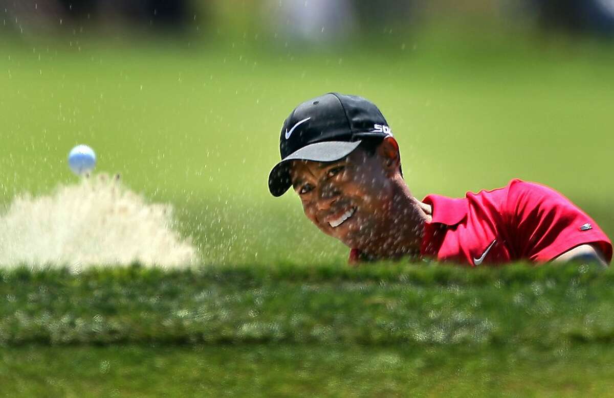 SAN DIEGO - JUNE 15: Tiger Woods hits out of a bunker on the seventh hole during the final round of the 108th U.S. Open at the Torrey Pines Golf Course (South Course) on June 15, 2008 in San Diego, California. (Photo by Donald Miralle/Getty Images)