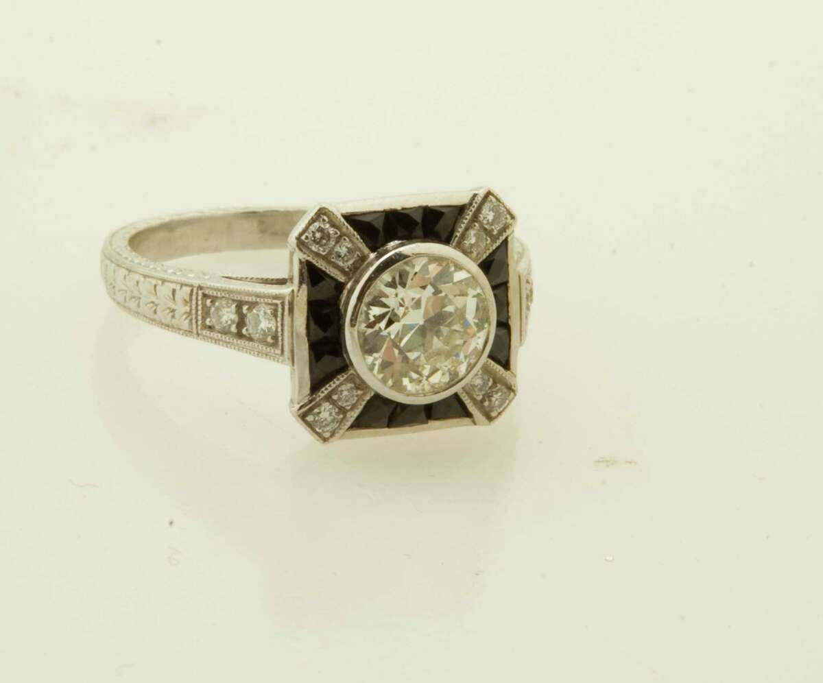 Deco platinum and onyx ring with 1 carat center, Tenenbaum & Co., $8,900