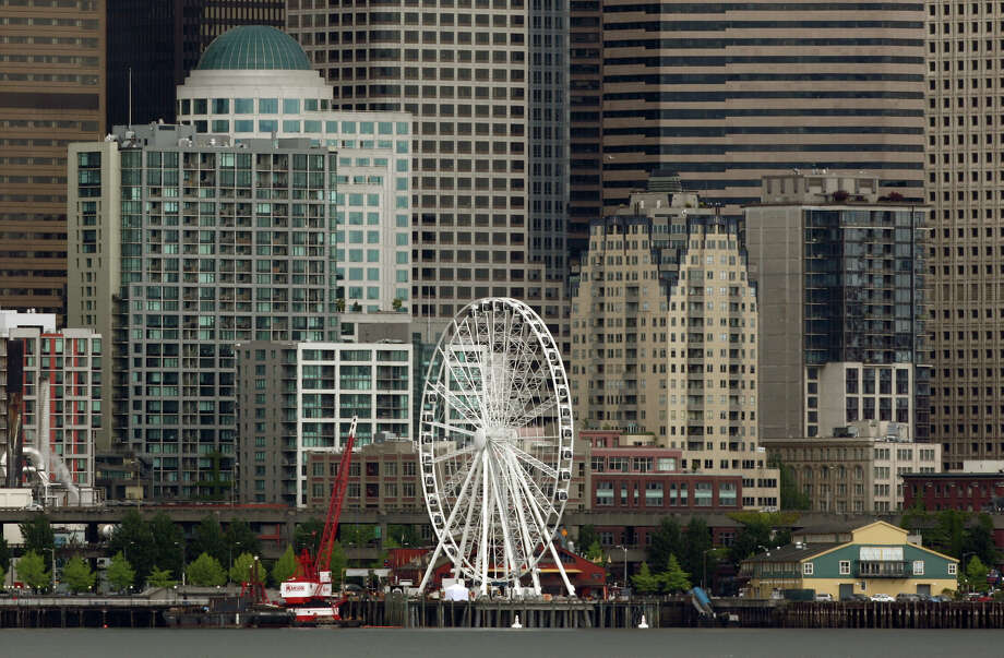 Gondolas attached to Seattle 'Great Wheel' Ferris wheel