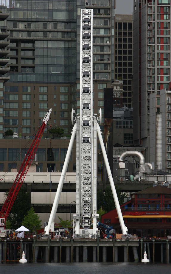 Gondolas attached to Seattle 'Great Wheel' Ferris wheel