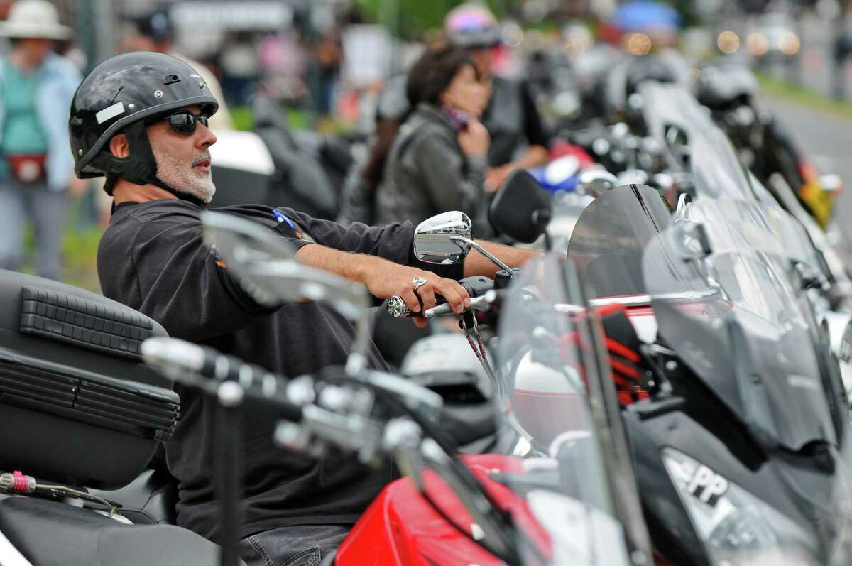 Kevin Nash of New Paltz prepares to start riding his Harley Davidson Ultra Glide, from his parking spot on Beach Road, as bikers arrive in the village for the annual Americade, on Tuesday June 5, 2012 in Lake George, NY.