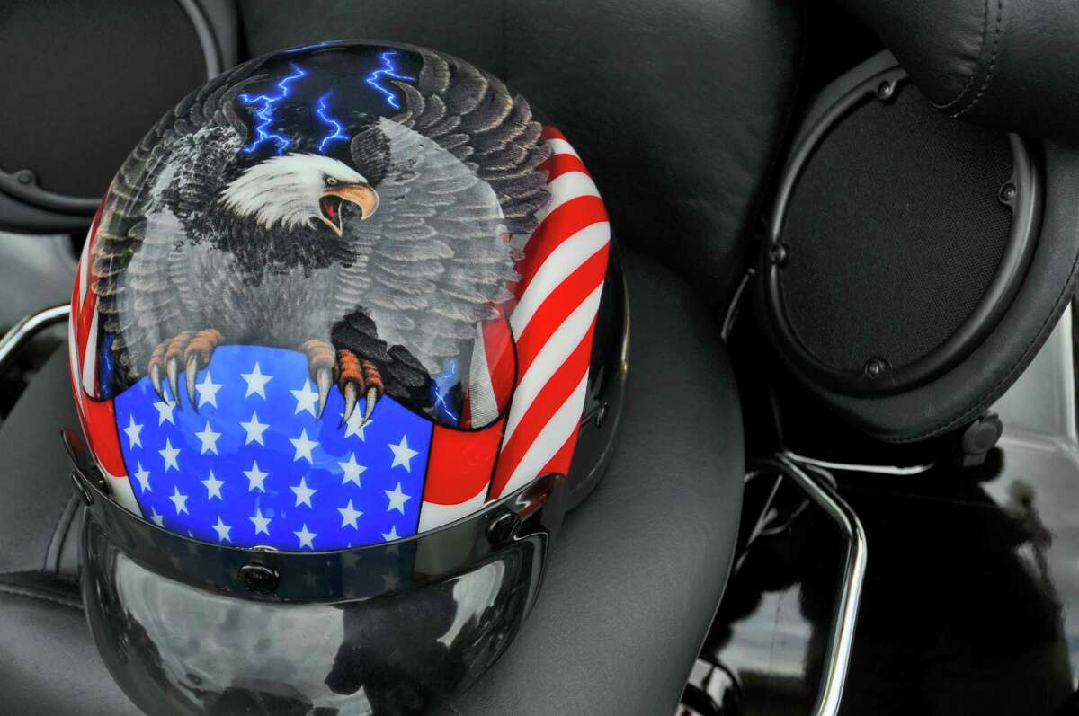 A helmet awaits its rider on Beach Road, as bikers arrive in the village for the annual Americade, on Tuesday June 5, 2012 in Lake George, NY. 