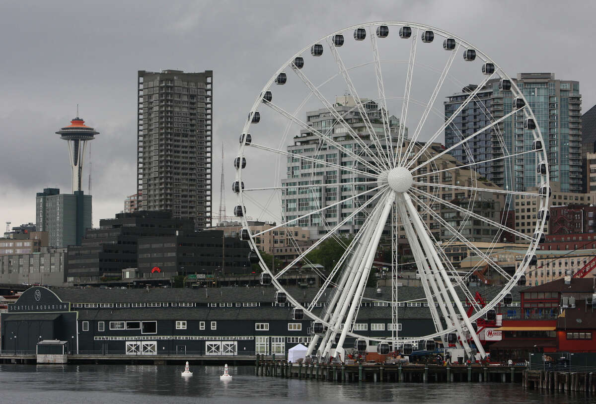The Seattle Great Wheel is shown from Elliott Bay. The nearly 175 foot-tall Ferris wheel being constructed at the end of Pier 57 on the Seattle waterfront will begin operation by July 4th. Each car has heating and air conditioning and the wheel can be operated year round. The massive wheel dramatically changes the Seattle skyline as seen from the water.