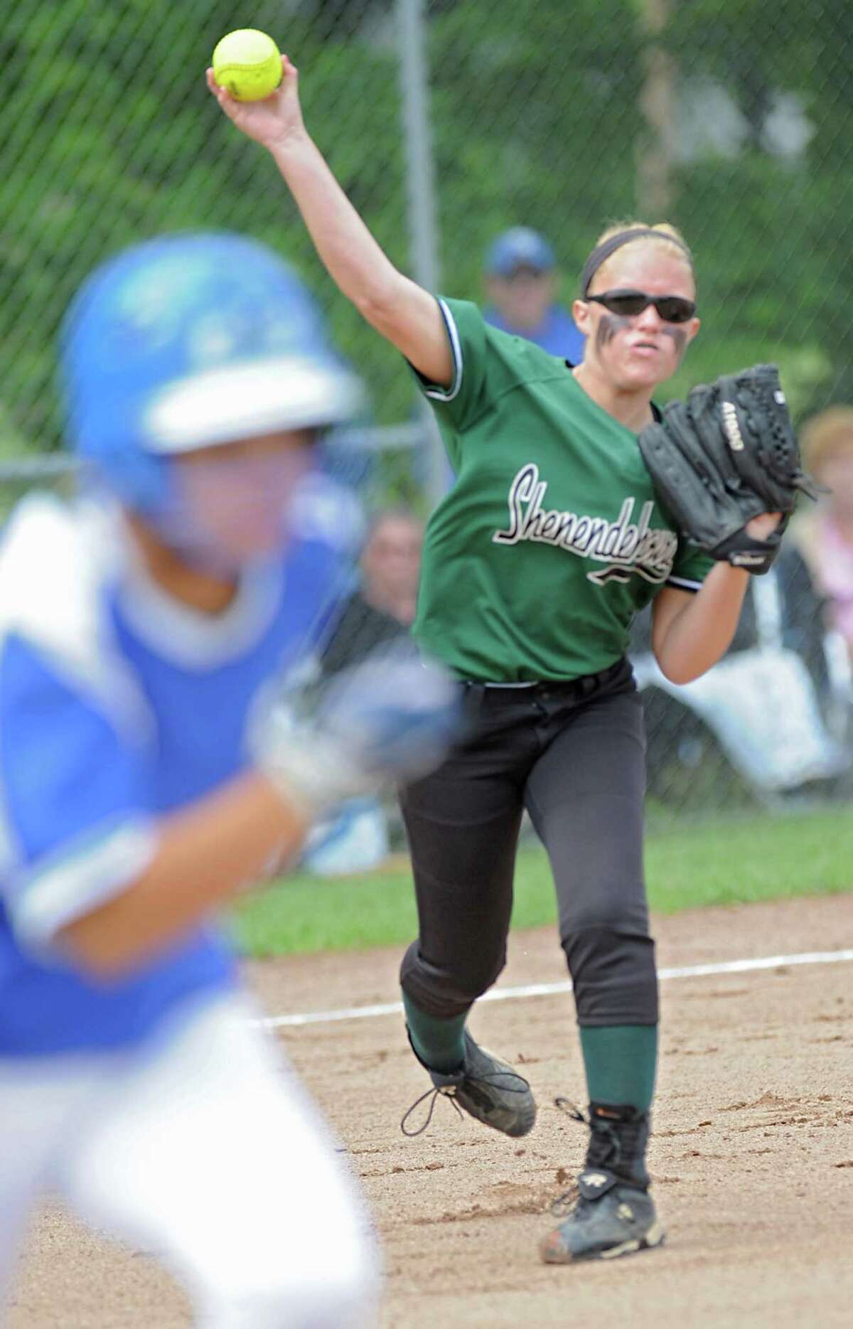 Shenendehowa pitcher Erika Daigle throws a grounder to first base during a state Class AA regional softball game against Cicero-North Syracuse June 5, 2012 in Colonie, N.Y. (Lori Van Buren / Times Union)