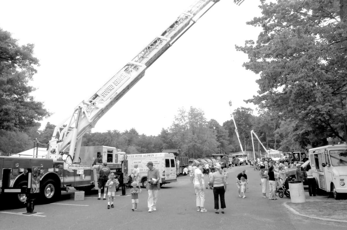 The Junior League of Greenwich will hold "Touch a Truck," its annual spring fundraiser event, at Town Hall - rain or shine - on June 10, from 10 a.m. to 3 p.m. Above, children of all ages enjoy a past "Touch A Truck" event.