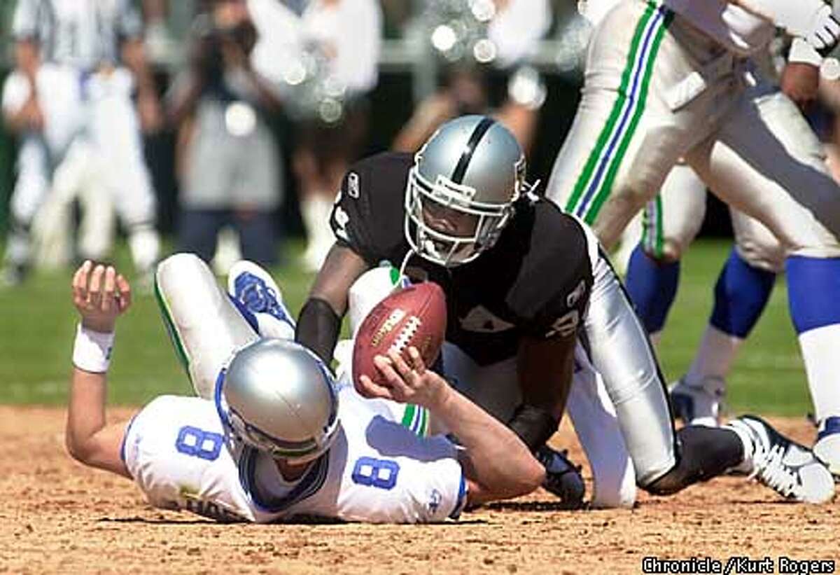 Ricky Watters of the Seattle Seahawks celebrates with Teammate