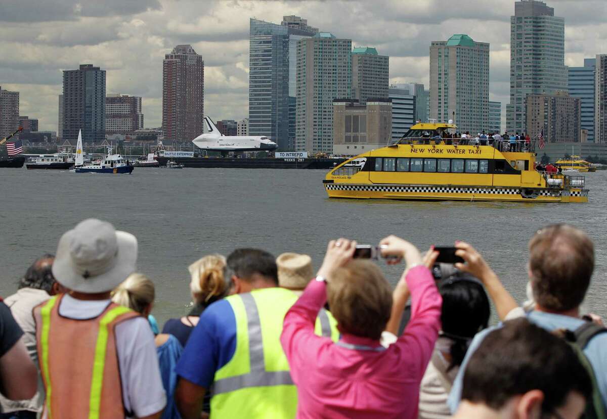 Space shuttle Enterprise arrives at Manhattan home