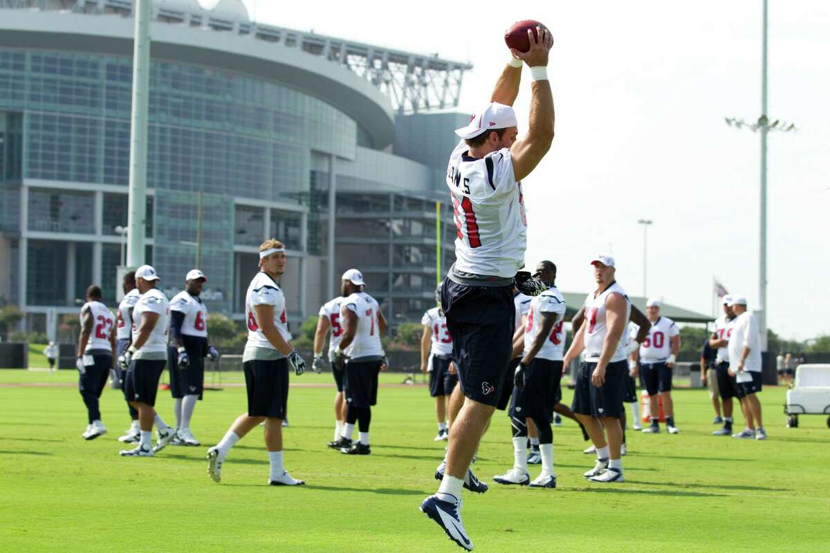 Houston Texans tight end Owen Daniels (81) makes a catch in the end zone during Texans organized team activities at the Methodist Training Center Thursday, June 7, 2012, in Houston.