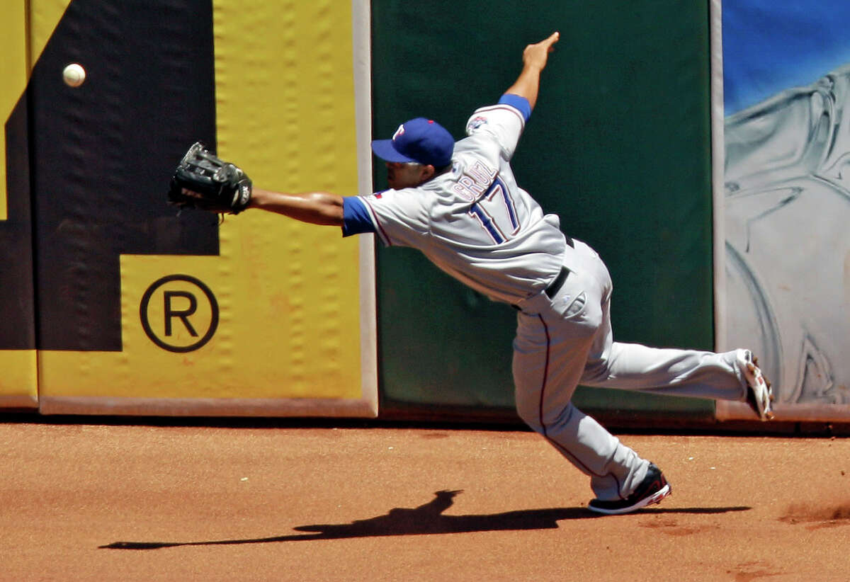 American League's Nelson Cruz of the Texas Rangers hits a pitch