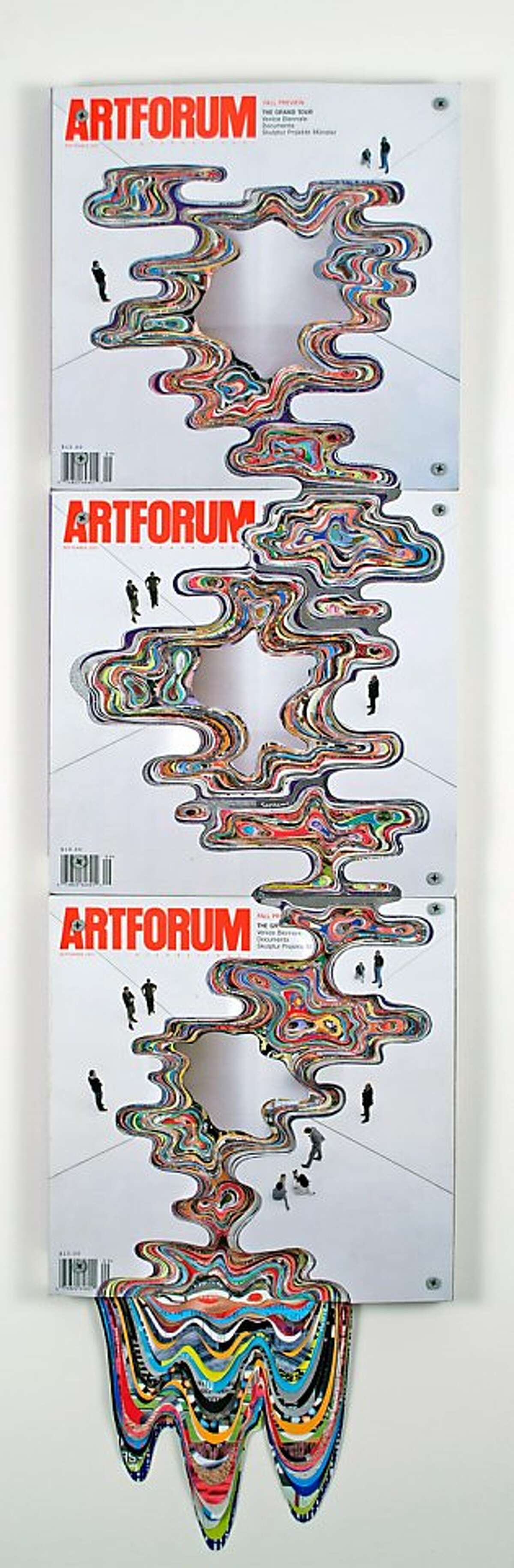 "Artforum #35 Collaboration with Bruce Nauman (Pour Series)" (2012) altered ARTFORUM magazines by Francesca Pastine 38 x 12 x 4 inches