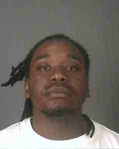 Troy man arrested for firing shots